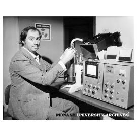 Senior lecturer Dr Brian Roberts with electron scanning microscope