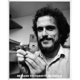 Dr Andrew Cockburn with marsupial Antechinus