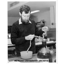 Dr John Baldwin with preserved specimen of Giant Gippsland Earthworm