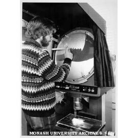 Dr Gordon Sanson measuring magnified profile of lower jaw