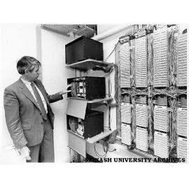 Computer Centre director Dr Cliff Bellamy explaining workings of MONET node