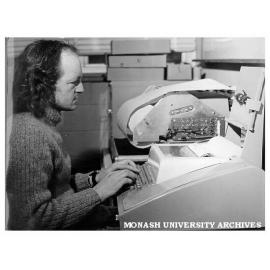 Graduate Tony Brown at Braille computer terminal, designed in association with Dr Cliff Bellamy