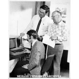 Mr Doug Axnick, design engineer with Shire of Pakenham (seated), Dr Jack McDonell, director of Centre for Continuing Education, and course coordinator Mr James Crockart