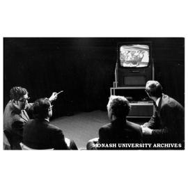 Education faculty discussing seminar techniques, from left: Dr D. Phillips, Dr K. Cleverley, Mr J. Fyfield, and Mr J. Clift