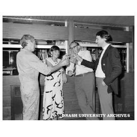 Alexander Theatre staff celebrating new facilities. from left: Graham McGuffie (technician), Wendy Todd (bookings secretary), Phil A'Vard (theatre manager), and Michael Lee of Buildings Branch