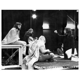 Rehearsal for 'The White Devil'. Director Adrian Guthrie (right) talking to members of Monash Players during rehearsal