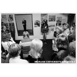 Pete Steedman opening 'Making Monash' exhibition alongside Fred William's portrait of Sir Louis Matheson