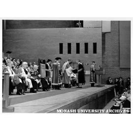 Dr Ernie Nunn receiving 25 year medallion from HRH Prince Philip, Duke of Edinburgh, Silver Jubilee Graduation ceremony