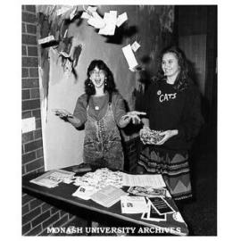 Felicity Pask and Michelle Gow greeting visitors to AIDS information seminar