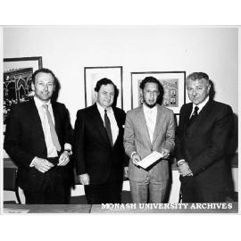 Launch of Wills Record Office Pty Ltd. from left: Paul Hudson, Montech; Peter Wade, Comptroller; Professor Les Goldschlager, Computer Science; and Henry Burstyner, Solicitor