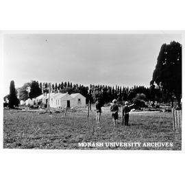Stephen, Audrey and Roger Matheson looking at Talbot Colony buildings