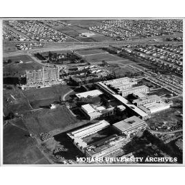 Aerial view of Science buildings and Humanities building under construction from north looking towards intersection of Wellington and Dandenong roads