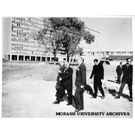 Henry Bolte and official party after driving in first peg for Religious Centre