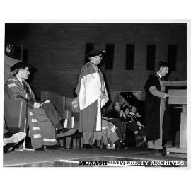 Vice-Chancellor Dr Louis Matheson (centre) being awarded honorary doctorate in Law with Chancellor Sir Richard Eggleston (left) looking on