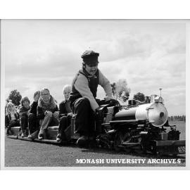 Graeme Daniel and children on model steam train