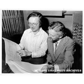 David Harris (right) and organist-adviser John O'Donnell studying score of 'Orgelwerk'