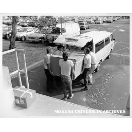 Hall staff taking delivery of audio-mixer