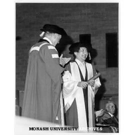 Dr Hiroyuki Iwaki receiving honorary Doctor of Laws from Chancellor Sir George Lush