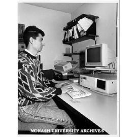 Student Vafa Shams working in Hargrave Library