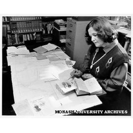 Hargrave librarian Marta Chiba preparing material for exhibition