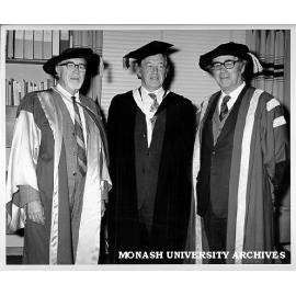 Honorary Doctor of Letters C. B. Christesen (left) with Victorian Premier Mr Rupert Hamer and Chancellor Sir Richard Eggleston