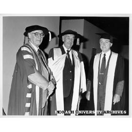 Honorary Doctor of Laws Sir Colin Yorke Syme (centre) with Chancellor Sir Richard Eggleston (left)