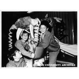 Krongold Centre children with dragon created for Chinese New Year, Jake McCarthy, Mathew Galt and Sym Jackson