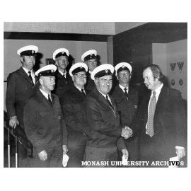 Drivers receiving awards from Acting Vice-Chancellor Professor Scott, from left: (back) John Tanner, Jack Finch, Allan Hickey; (front) Kevin Grace, Bill Kirby, Kevin Perry and Russell Hall