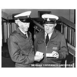 Drivers Jack Finch (left) and Kevin Perry with National Safety Council Freedom from Accident badges