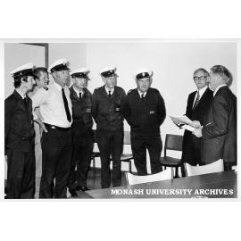 Central Services drivers being presented with Free From Accident certificates, from left: Ian Newbold, John King, Russell Hall, Rodney Dixon, Jack Finch and Kevin Perry, by Bill Cunningham and Acting Deputy Comptroller Len Candy