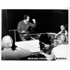 Japanese conductor Hiroyuki Iwaki with members of Melbourne Symphony Orchestra