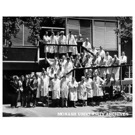 Bates, Smart and McCutcheon staff outside their office