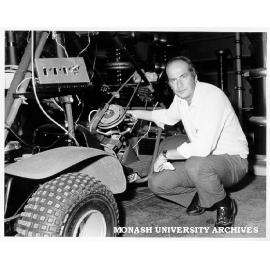 Professor Ray Jarvis with robot dune buggy