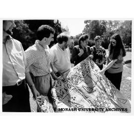 Development Studies Centre staff with ceremonial tapa mat from Tonga