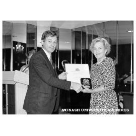 Dean of Engineering Professor Peter Darvall accepting Institute of Engineers Award from Mrs Hazel Hawke