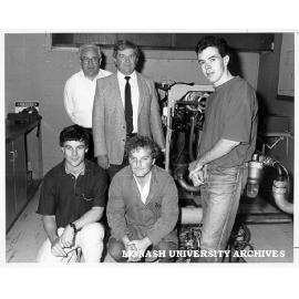 Students and staff with gas turbine designed and built with help of Ansett power plant manager Mr Alan Pickering (centre rear)
