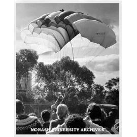 Students watching landing by Skydiving Club member