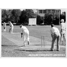 Professorial Board cricket match, Professor Owen Potter bowling to Dean of Medicine Professor Graeme Schofield