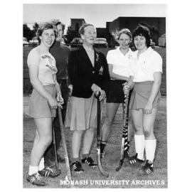 Coach and members of Women's hockey team, from left: Kathy Schinkel, Jane Ezard, coach Florence Vasey, Ro Nixon (?) and Ros Buzza