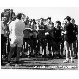 Richmond Football Club training at Monash with coach Kevin Bartlett (right) addressing team
