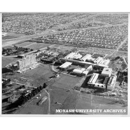 Aerial view of completed Science buildings, 16 July 1962, with Engineering buildings under construction in right foreground and Humanities building to left
