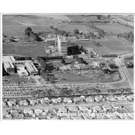 Aerial view of construction of Humanities and Medicine buildings, July 1962, from west with Beddoe Avenue in foreground