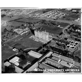 Aerial view of building construction, July 1962, from north west with Science buildings in foreground