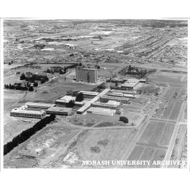Aerial view of building construction, 21 January 1963, from north west with car parks on right