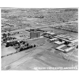 Aerial view of buildings, 21 January 1963, from north east, with Main library on left and Engineering on right