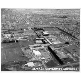Aerial view of site and buildings, December 1963, from north, with north ring road in foreground