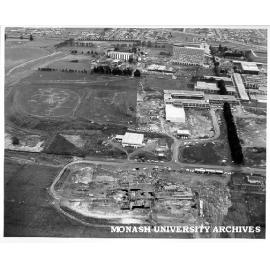 Aerial view of site and buildings, December 1963, from north with CSIRO site in foreground