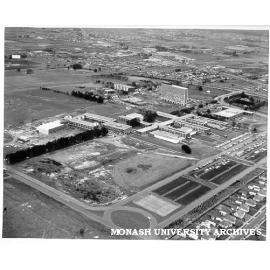 Aerial view of site and buildings, December 1963, from north west