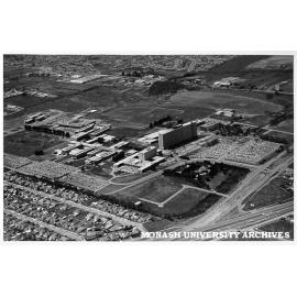 Aerial view of site, February 1966, from south west with intersection of Wellington and Dandenong roads in foreground