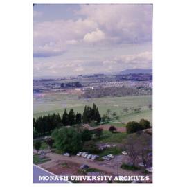 Raised view of undeveloped area to east (of Main library?), November 1964